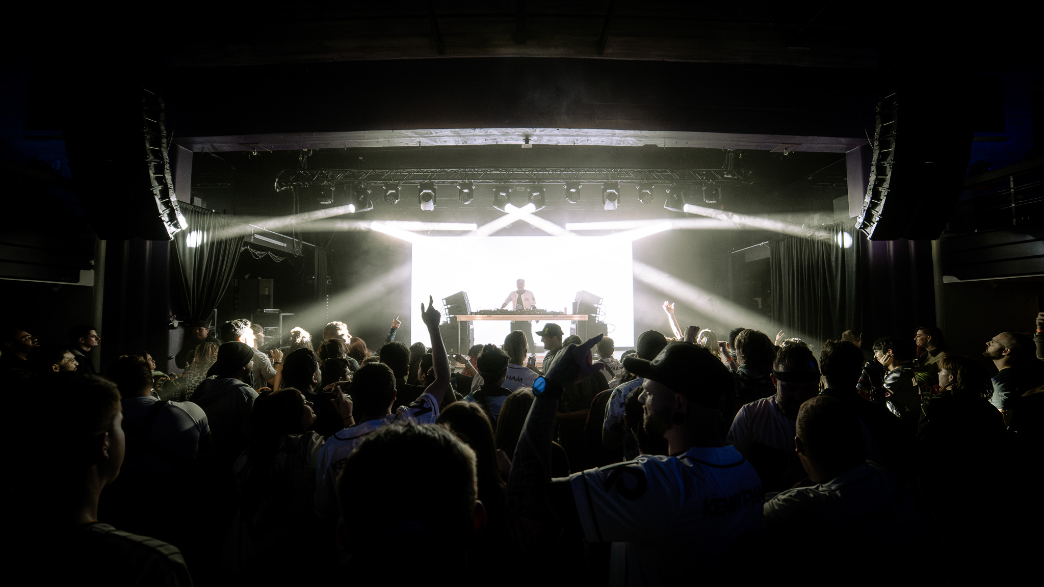 Kenny Pham crowd with bright stage lights